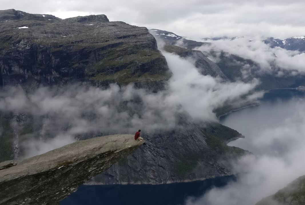 Day 5 - Sitting on the edge of Trolltunga Sitting on the edge of Trolltunga