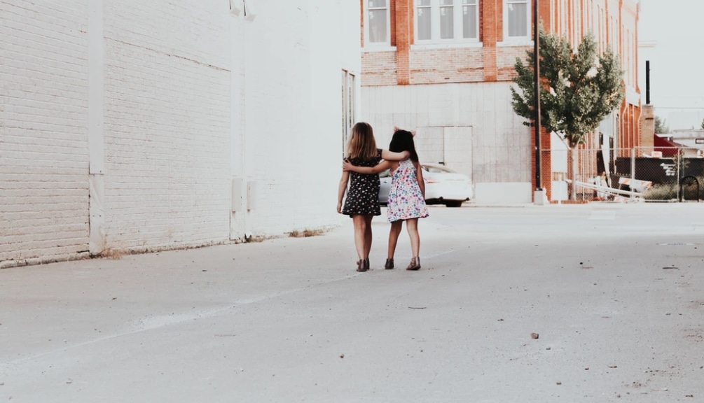 girls walking down street
