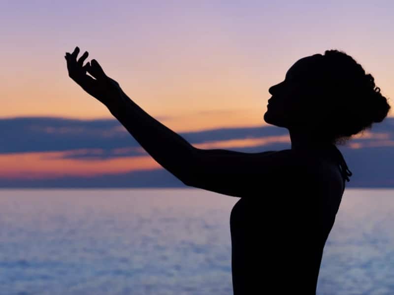 silhouete of woman mindful calm relaxing