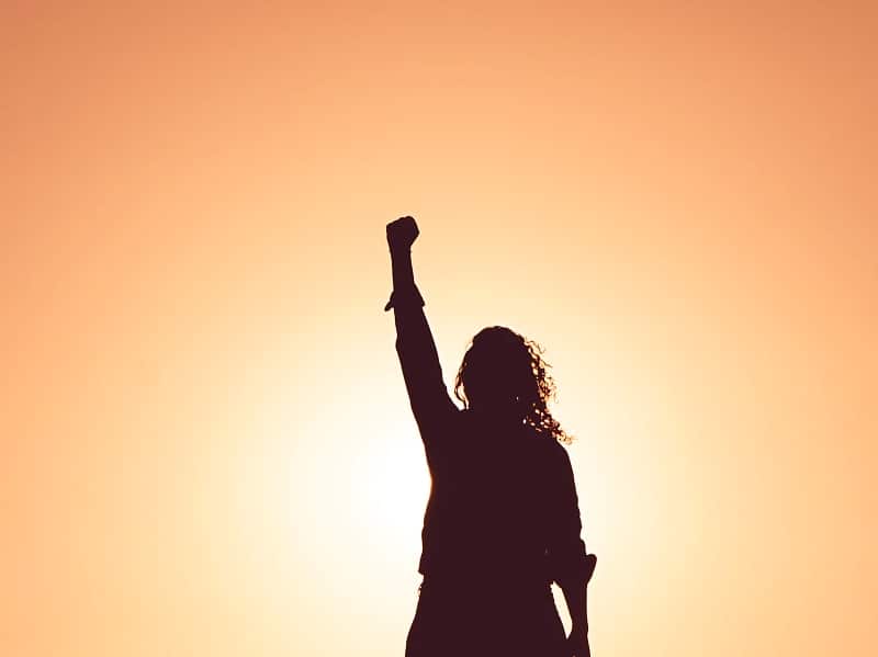 woman fist up in air