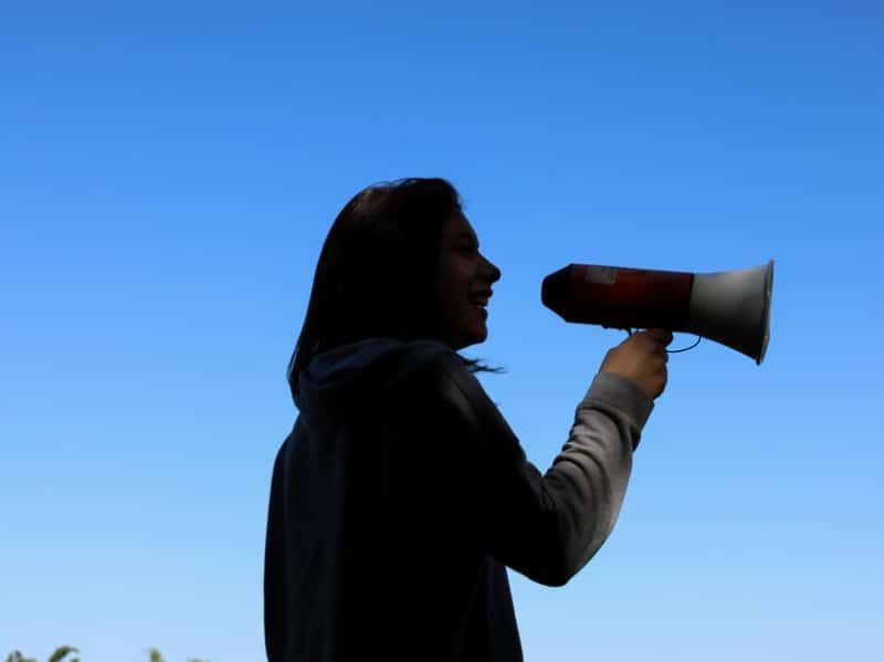 woman speak up megaphone