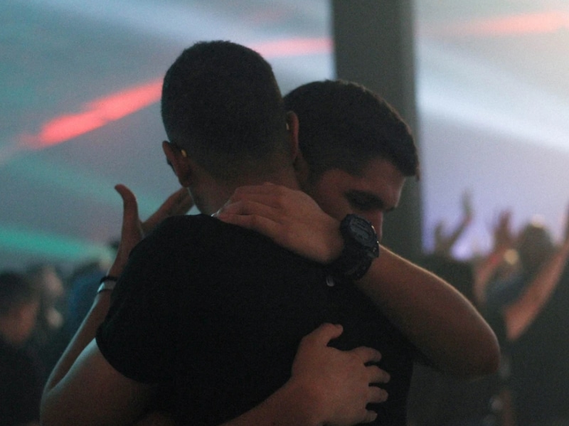 two men hugging