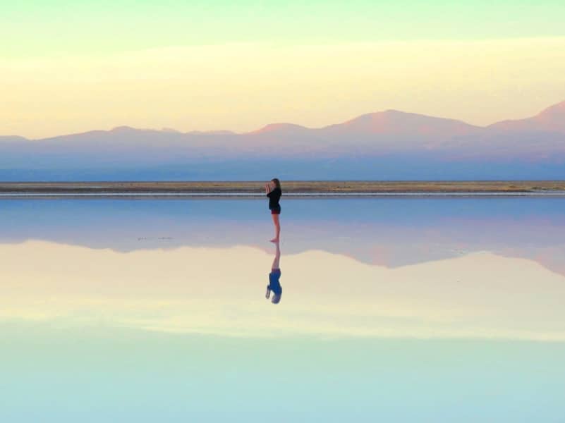 woman lake reflection