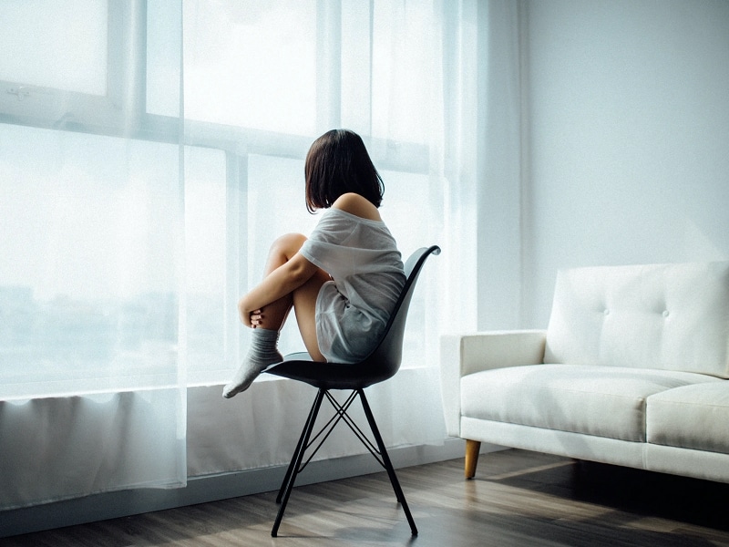 woman on chair alone
