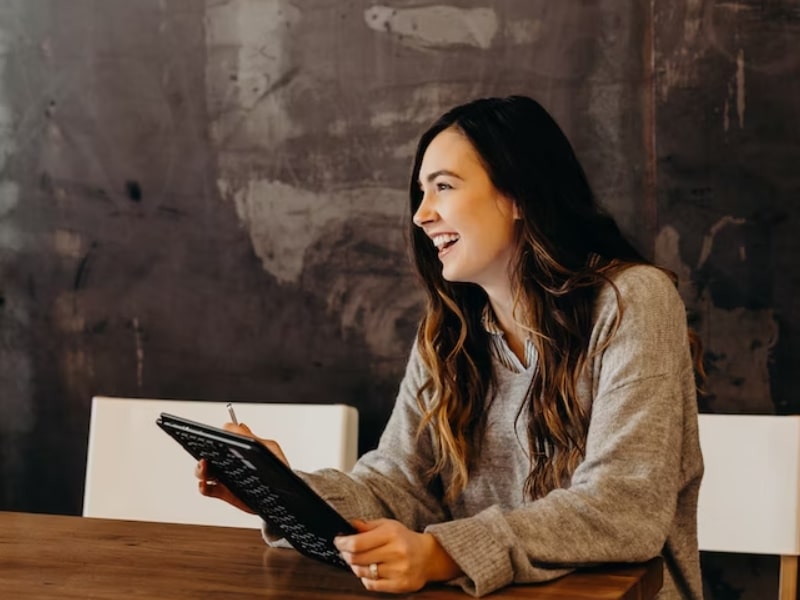 woman smiling at office