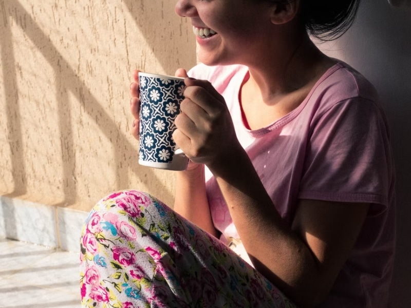 smiling woman with tea