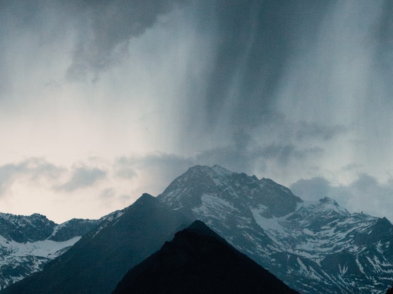 mountain with rain clouds